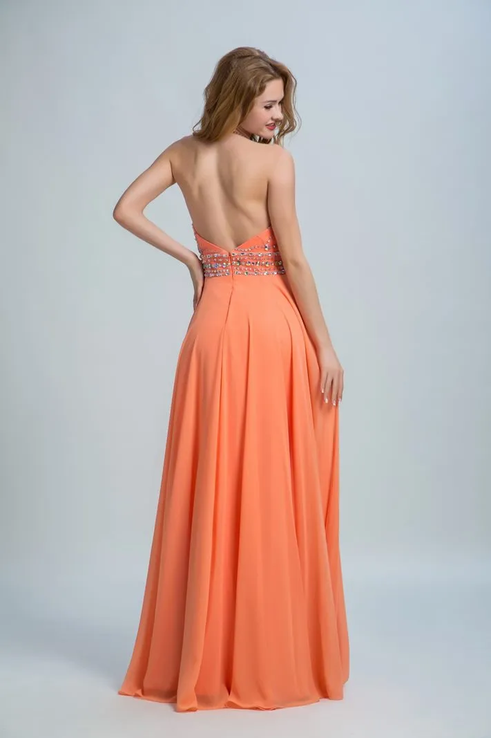 ---Sposamore ON LINE orange formal dress made in chiffon with halter neckline, open back and many decorations of sparkling stone