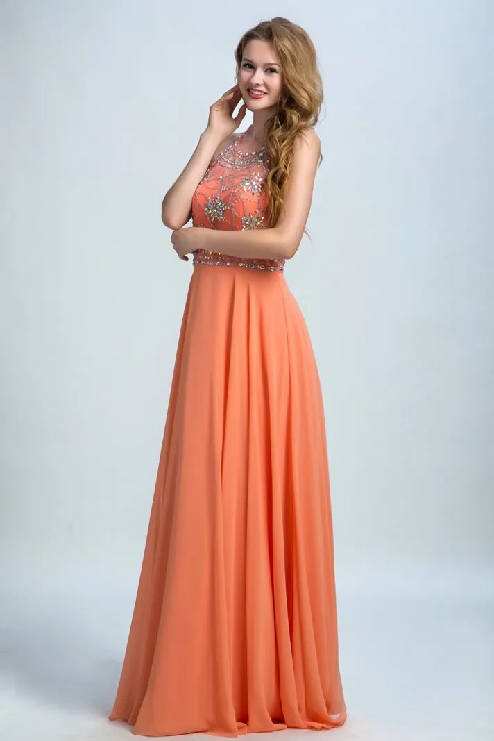 ---Sposamore ON LINE orange formal dress made in chiffon with halter neckline, open back and many decorations of sparkling stone